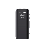 Amplificador y DAC portátil FiiO BTR15 con conectividad Bluetooth y pantalla, diseñado para mejorar audio en dispositivos móviles.